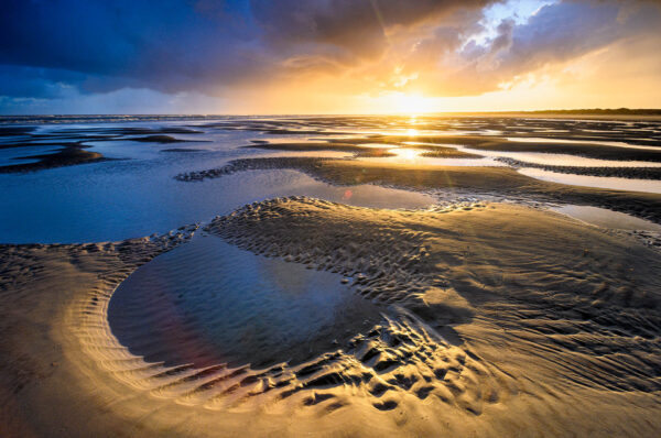 Zonsopkomst boven het strand